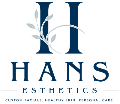 HANS ESTHETICS logo with navy initials and gray leaf accents on white background