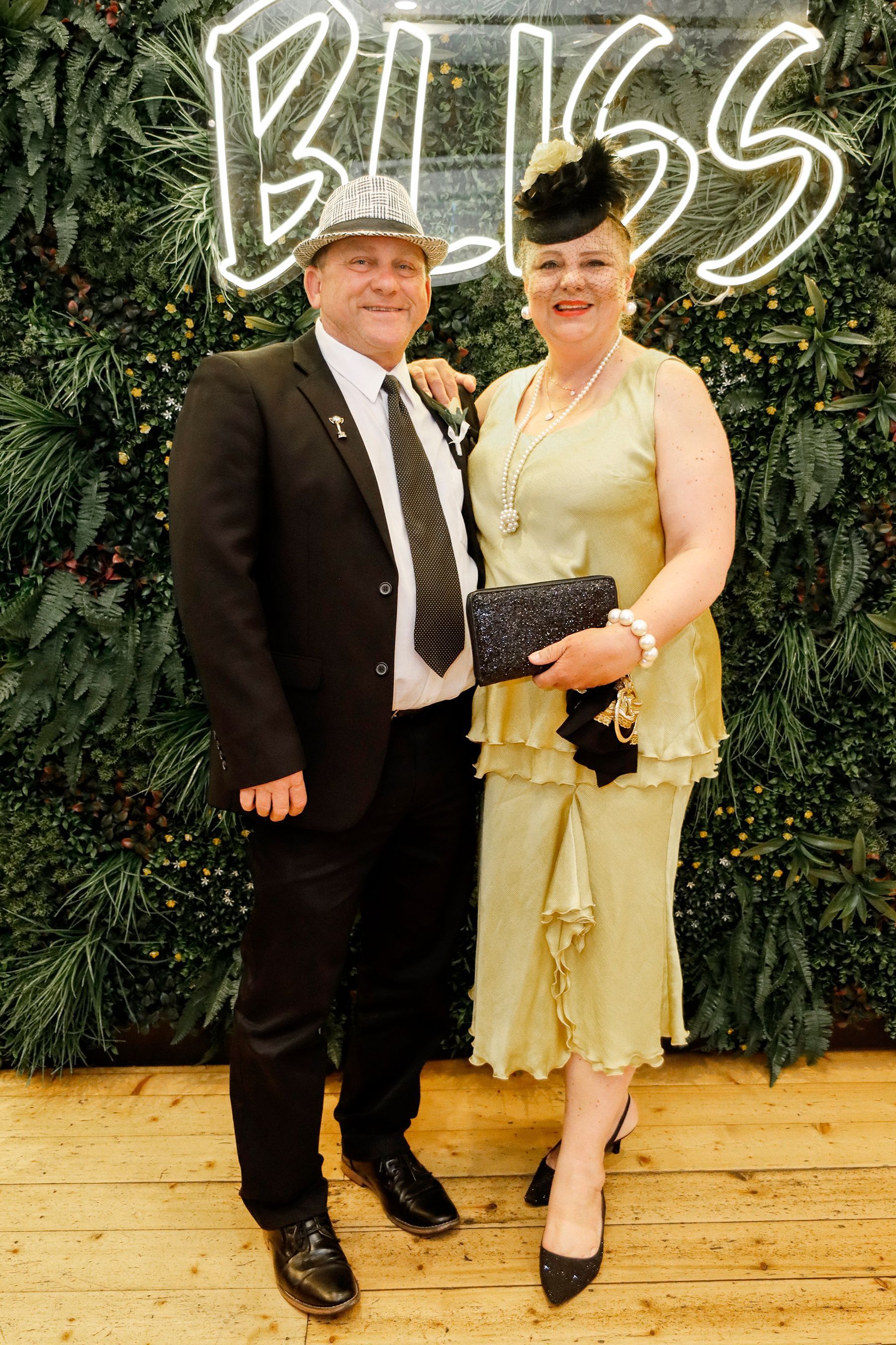 Couple poses in front of