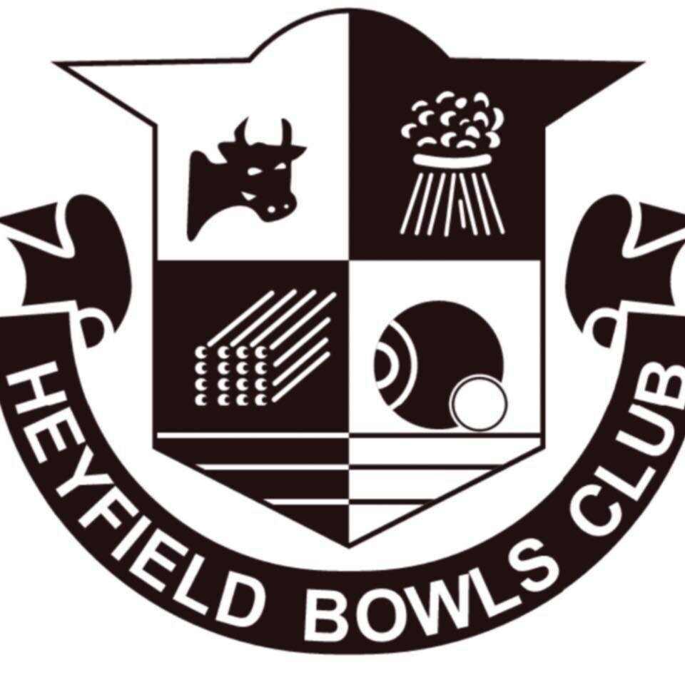 Heyfield Bowls Club logo: Shield with cow, sheaves, lawn bowls, and text