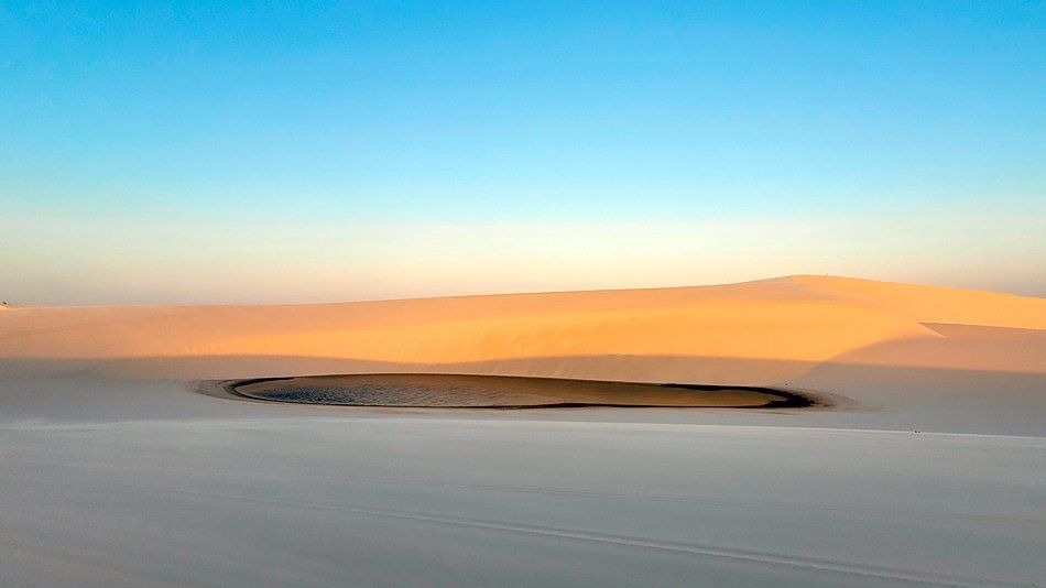 There is a small island in the middle of the desert.
