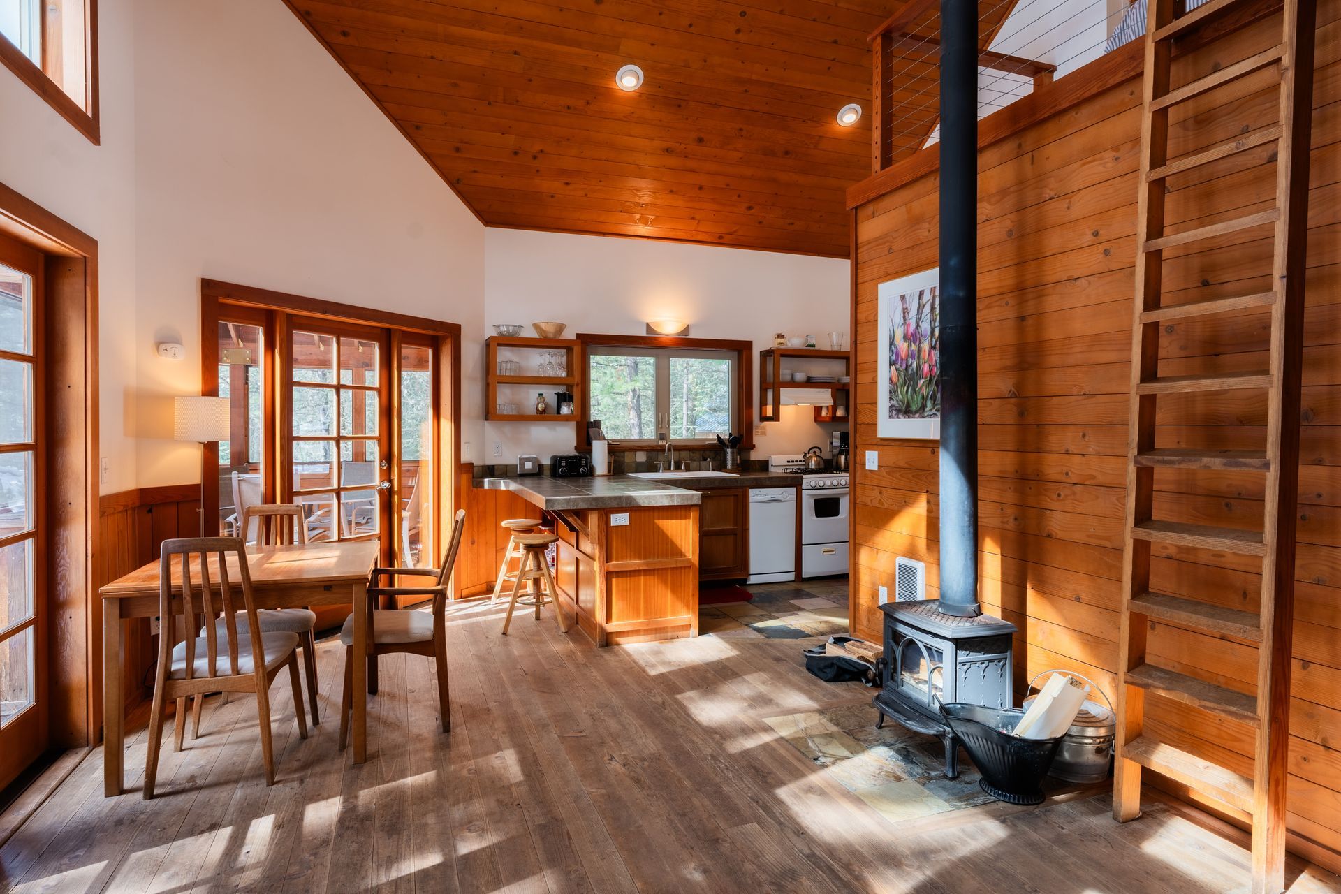 There is a wood stove in the middle of the room.