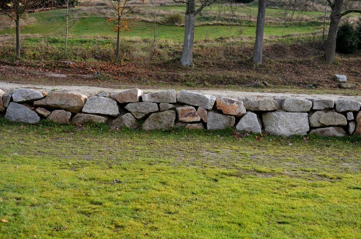 How Retaining Walls Help Control Erosion on Steep Yards