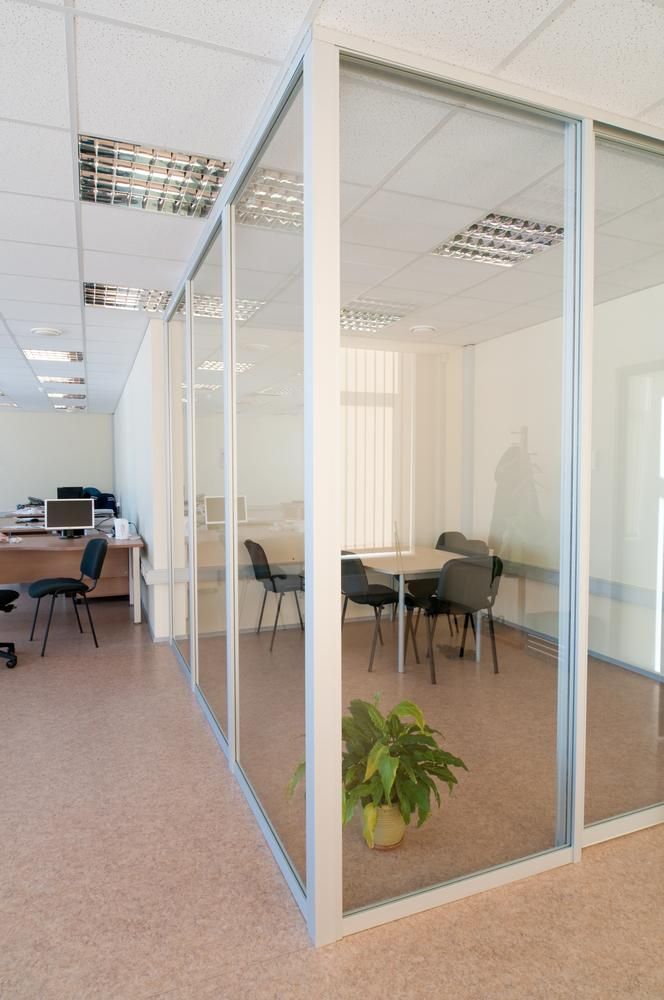 Conference Room With a Table and Chairs in an Office — G & A Glass & Aluminium in Charters Towers, QLD