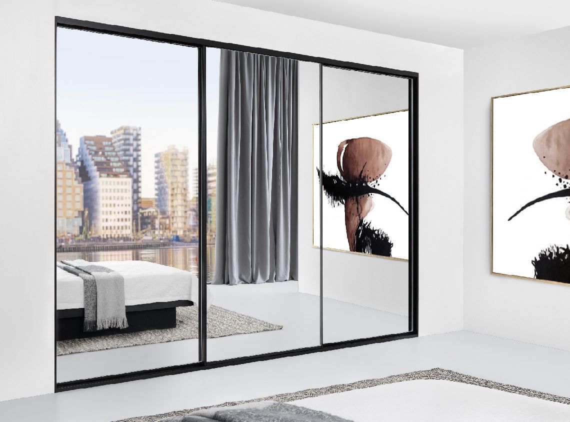 A Group Of People Are Installing A Window with a Glass Holder — G & A Glass & Aluminium in Cluden, QLD