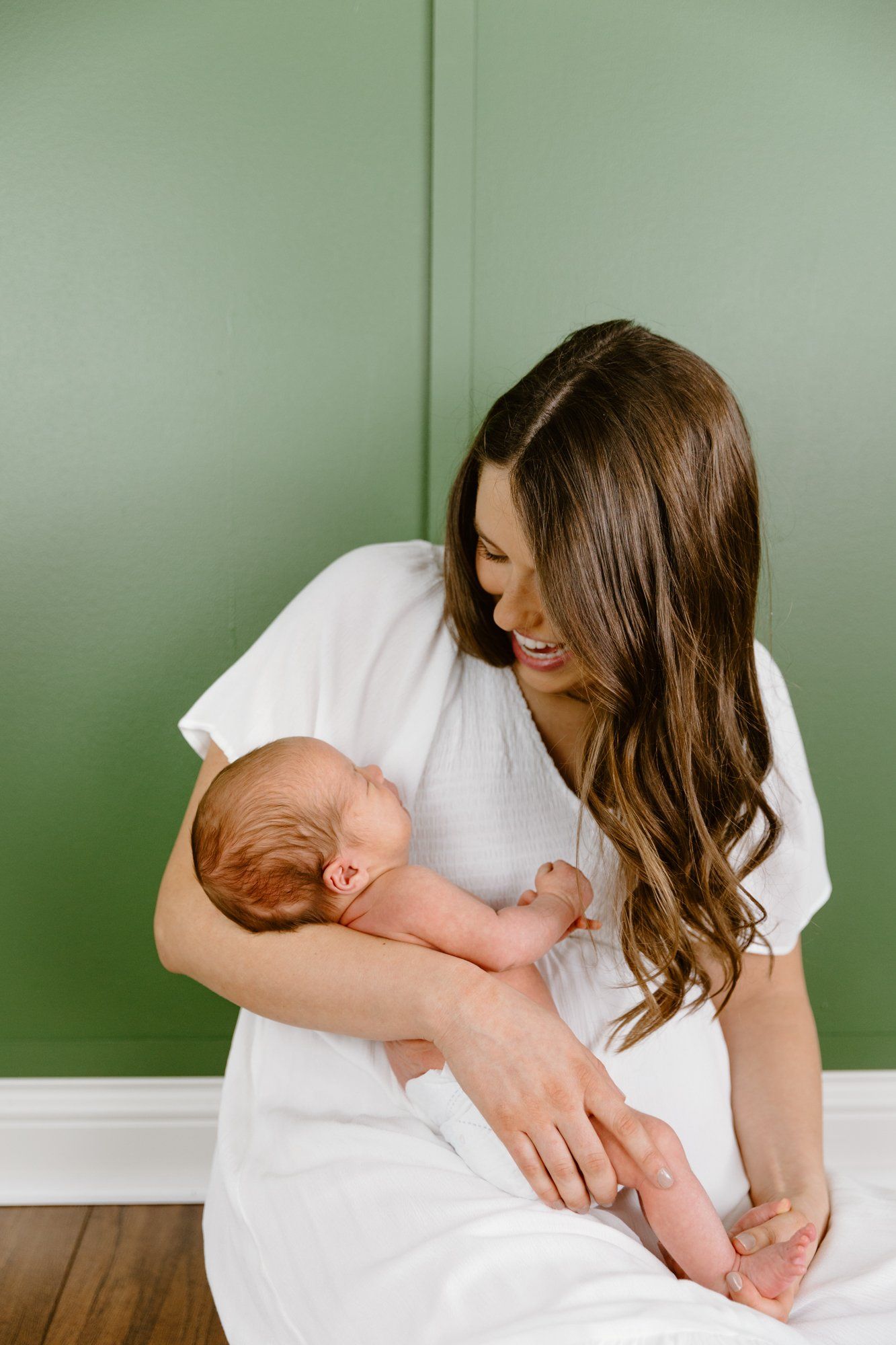 Mom holds baby boy