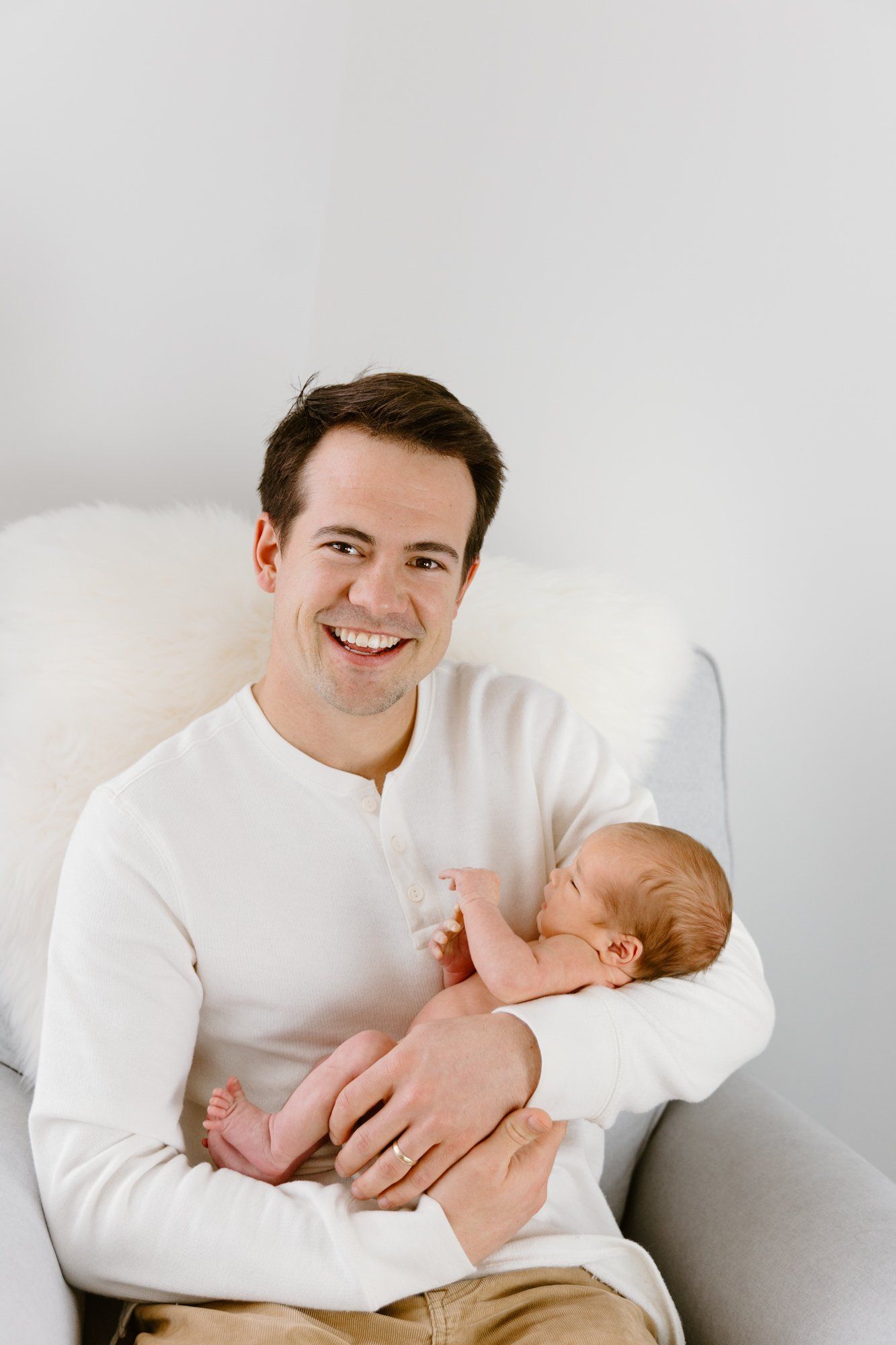 Dad holds baby boy