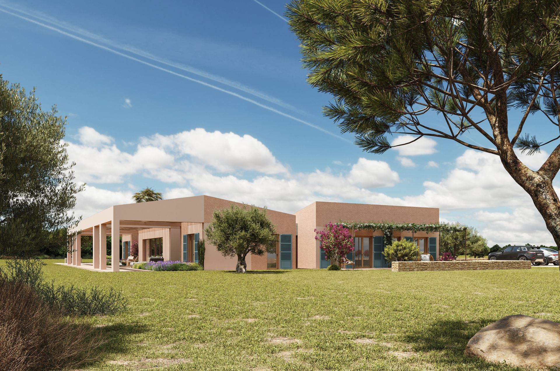 Casa rosa de una sola planta con porche cubierto, rodeada de césped verde y árboles bajo un cielo azul.
