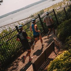 Paul and his two friends jogging outside