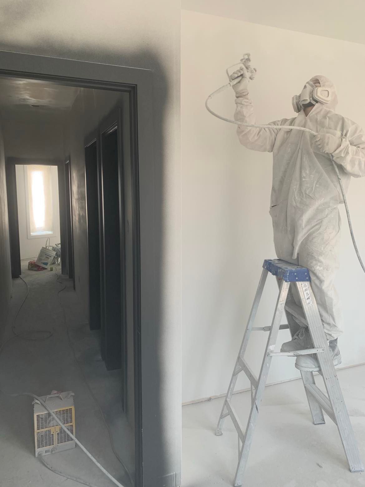 Left: hallway with gray doorframes. Right: person in protective suit spray-painting a white wall on a ladder.