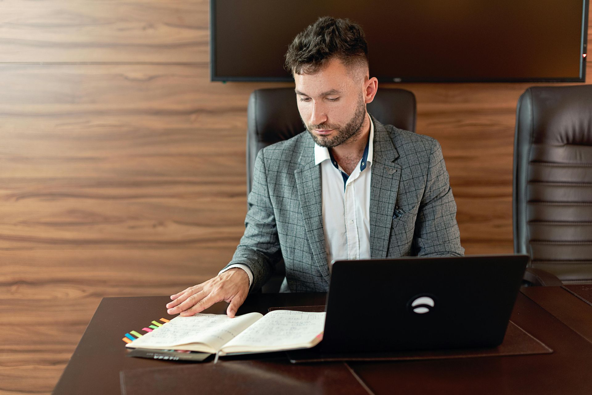 Startup founder reviewing QSBS qualified small business stock documents with attorney in SF