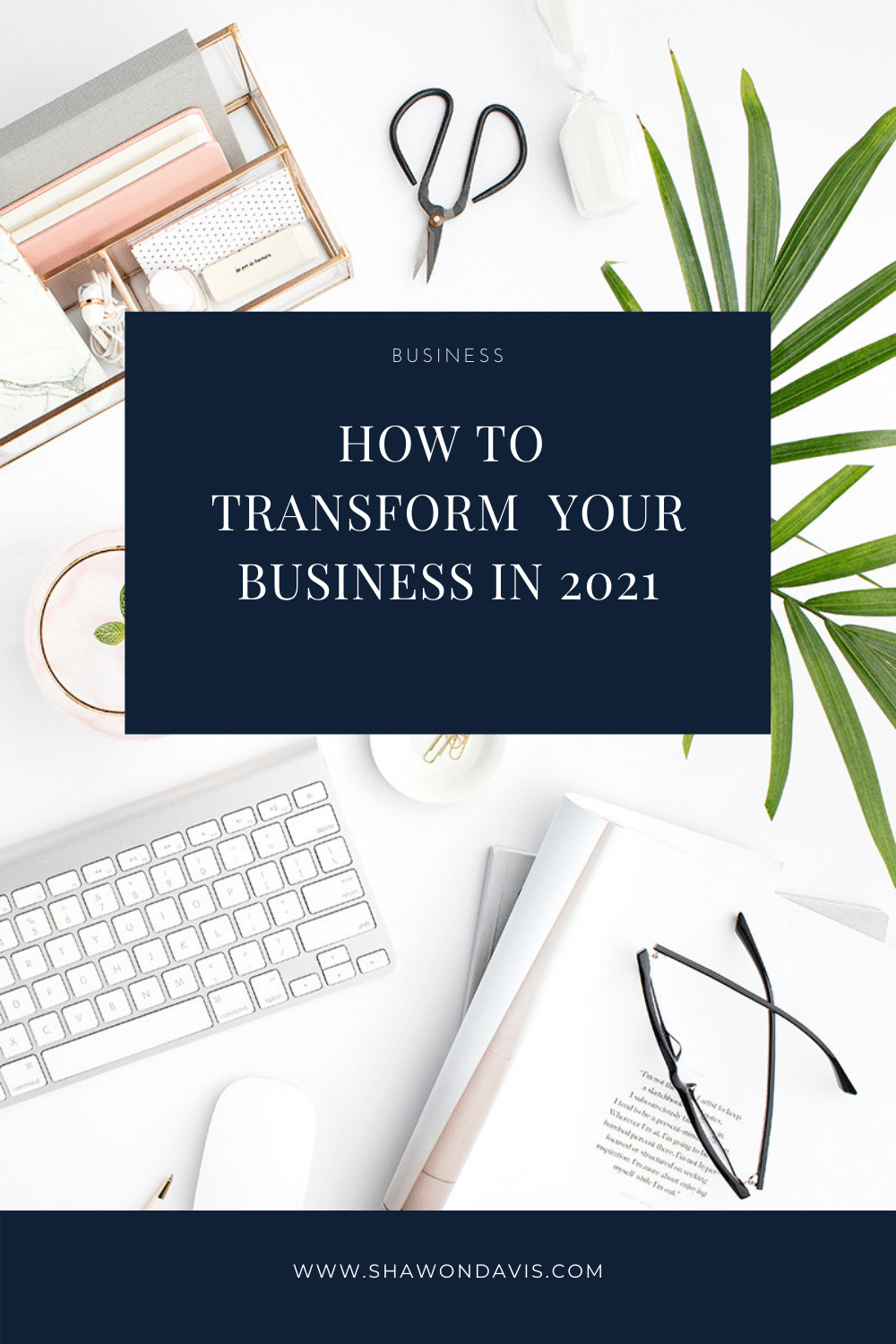 Desk flat lay with navy title card reading “How to Transform Your Business in 2021”