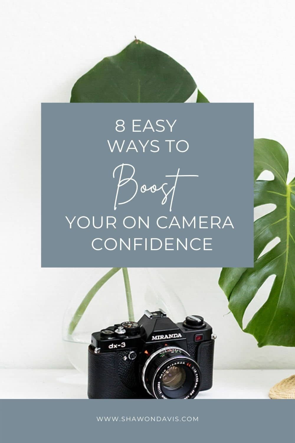 Camera on white desk with plant; text reads “8 easy ways to boost your on-camera confidence”