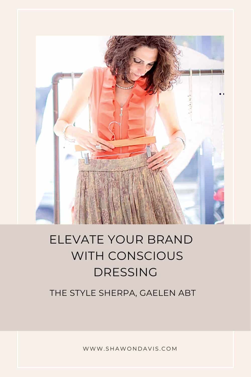 Woman in coral top and patterned skirt a bright boutique, with text about elevating your brand through conscious dressing.