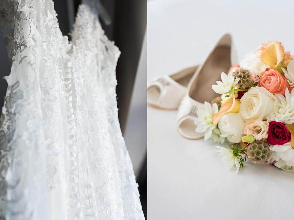 White wedding dress beside ivory heels and a pastel bridal bouquet