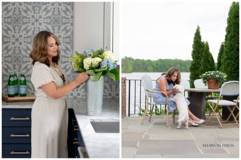 Woman arranging a blue-and-white bouquet beside a patio table overlooking the water