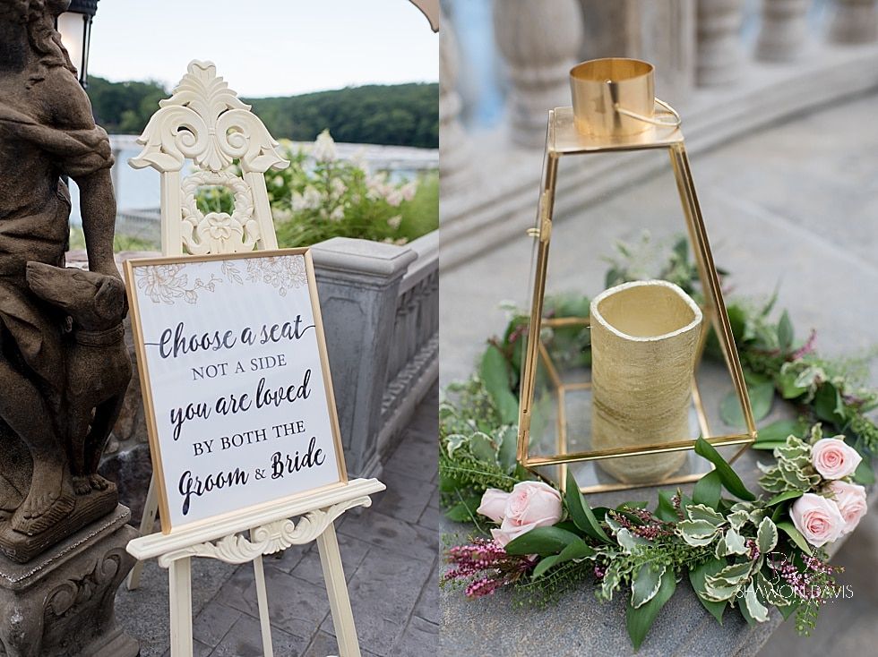 Decorative candle lantern beside a sign reading “Choose a seat not a side, you’re here for the bride and groom.”