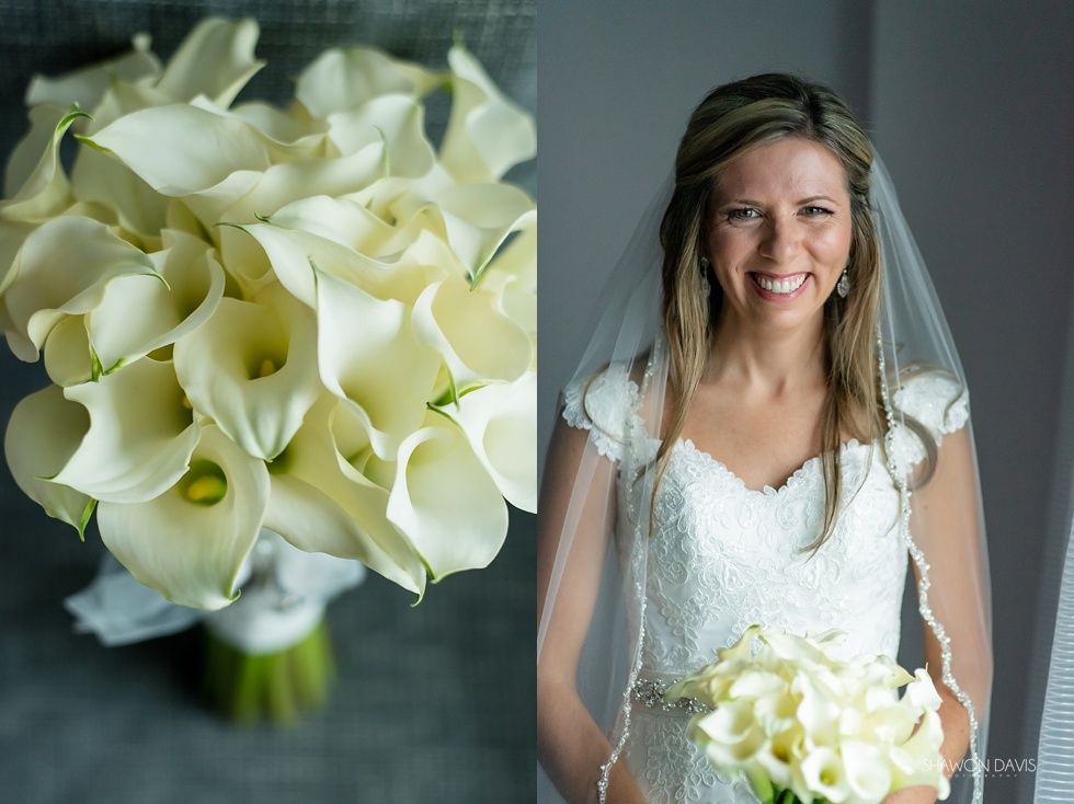 Bride holding white bouquet beside close-up of white calla lily bouquet