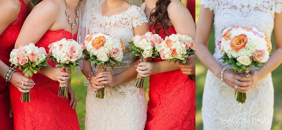 Bridesmaids in red and white dresses holding pink and white floral bouquets at a wedding