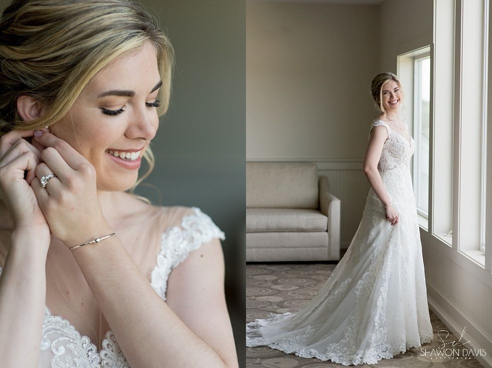 Bride smiling while adjusting earrings; full-length view of her wedding dress by a window