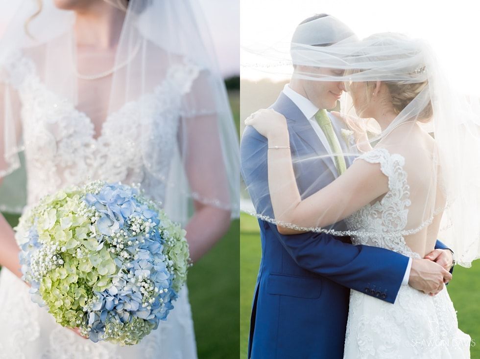 Bride holding a blue and white bouquet beside a groom in a blue suit during an outdoor wedding