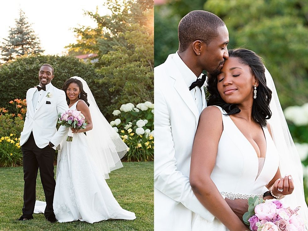 Wedding couple posing in a garden, bride in white holding pink bouquet, groom in white tuxedo