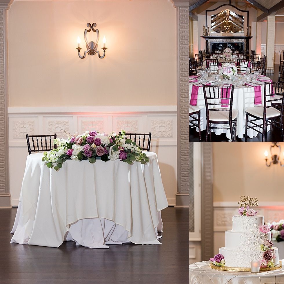 Elegant wedding reception tables with floral centerpieces and a tiered white cake in a decorated hall