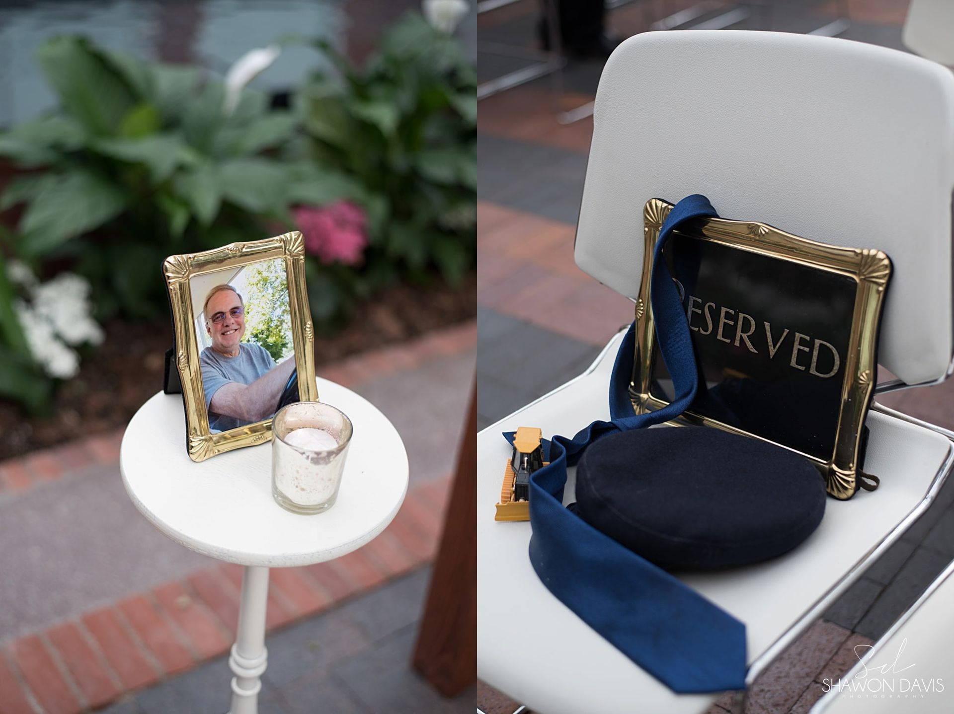 Memorial setup with framed photo, candle, and reserved chair with navy cushion outdoors