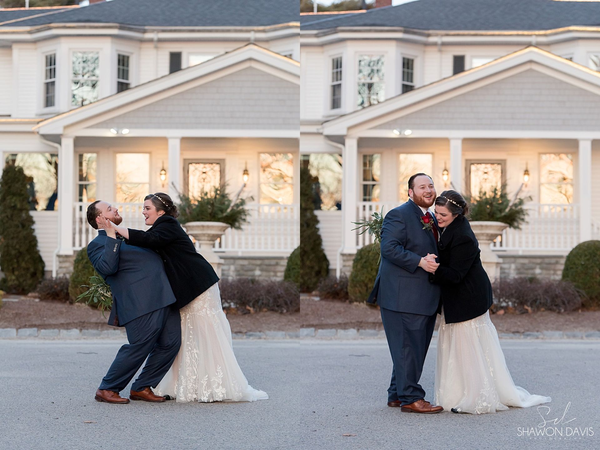 Couple embracing in front of a white house at dusk, dressed in formal wedding attire.