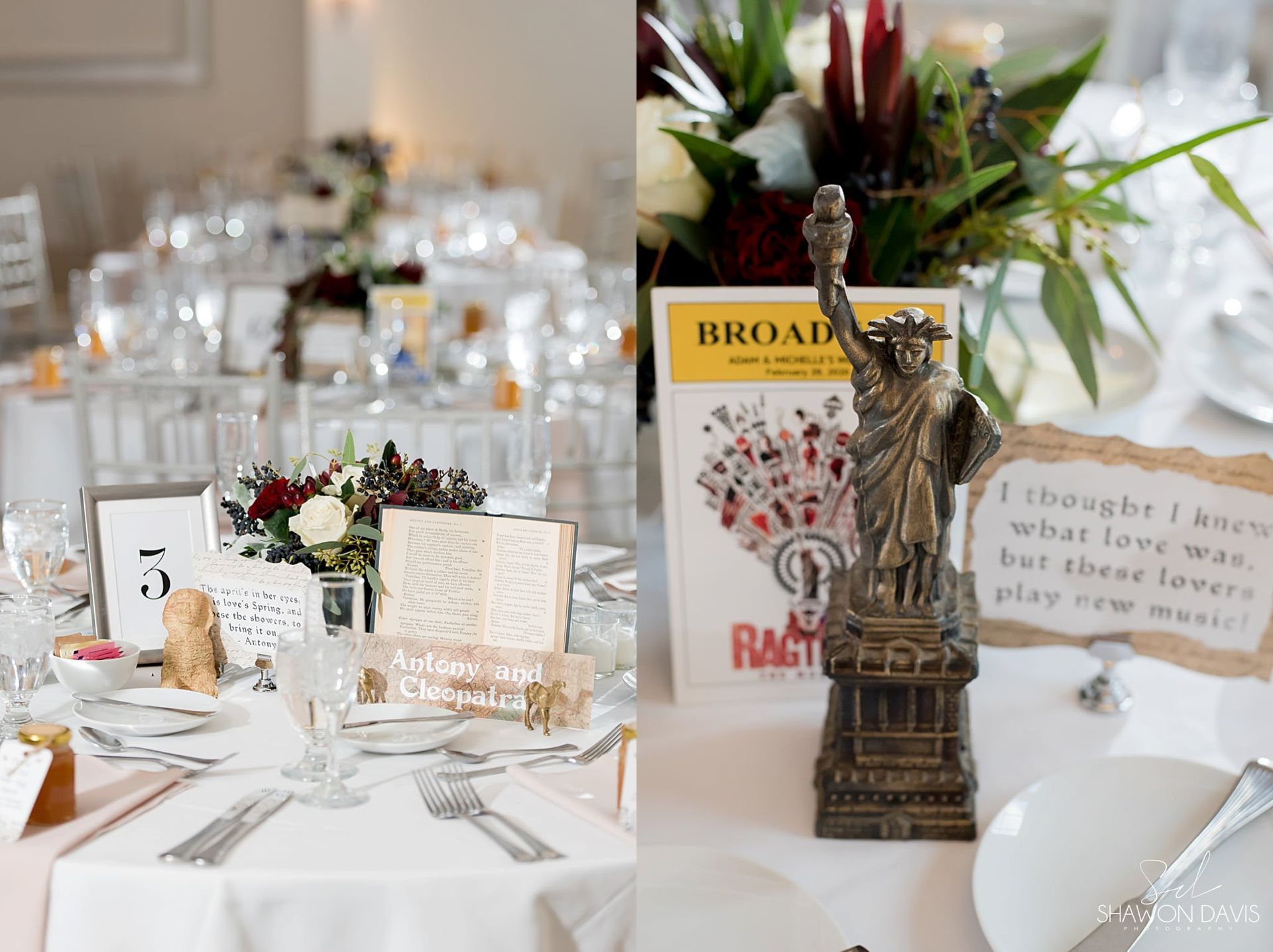 Elegant white-clothed banquet table with floral centerpieces, place cards, candles, and a rustic wedding sign display