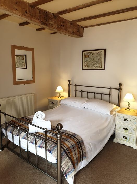 A double bedroom with en-suite in one of the onsite cottages