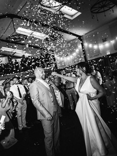 a couple having their first dance in the barn