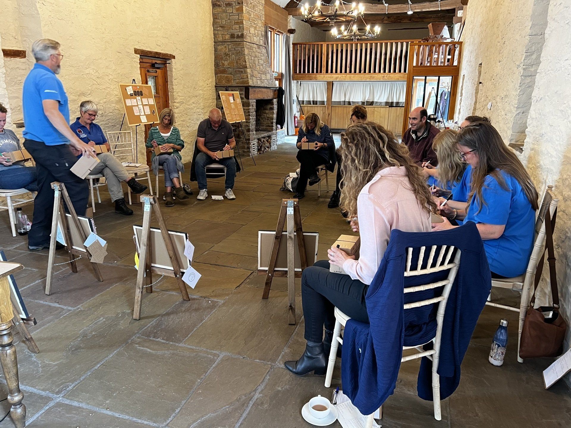 Meeting space in Brecon with chairs laid out in a circle for an art activity