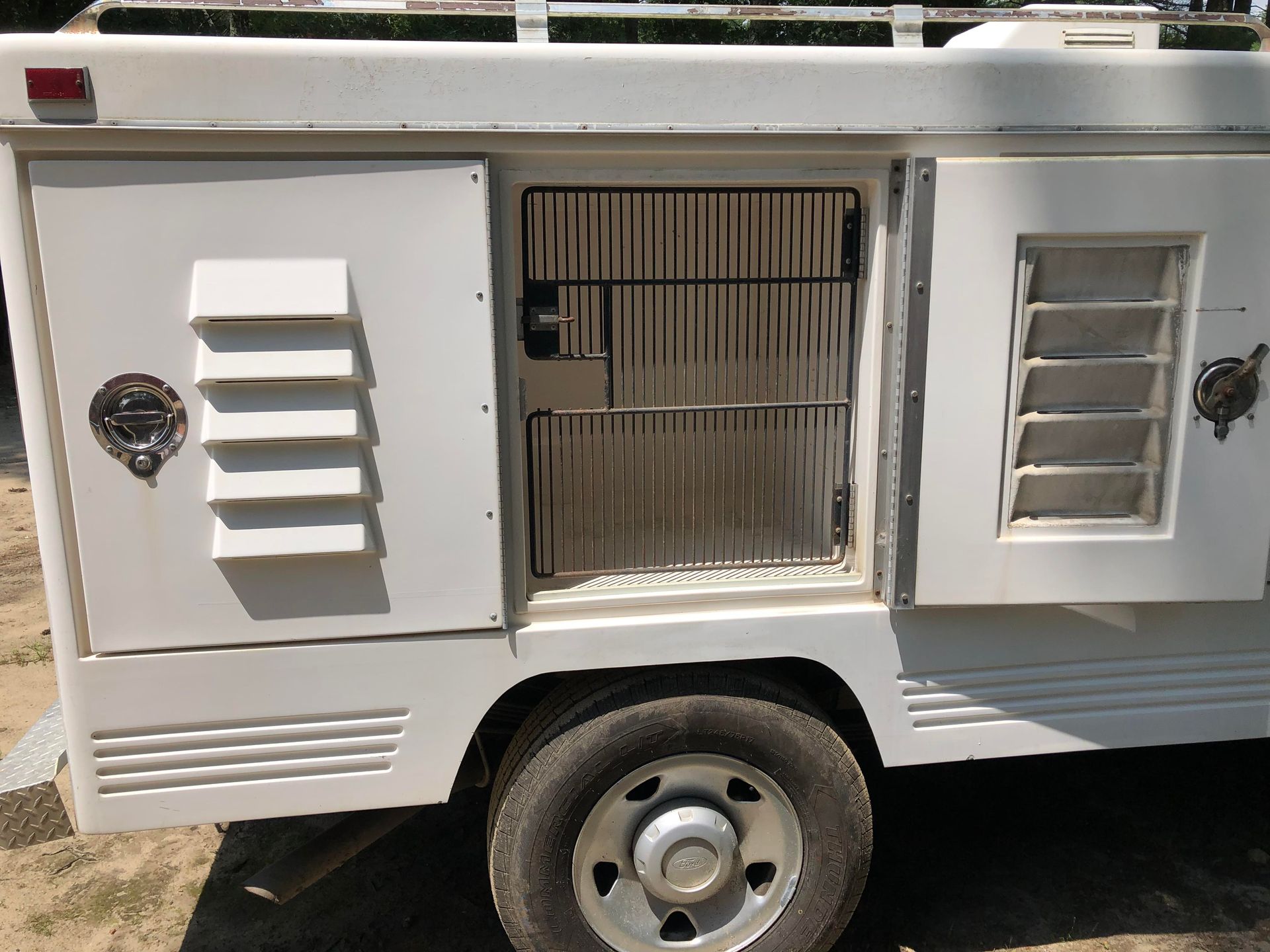 Side View of Vehicle — Middleborough, MA — G-Force Kennels