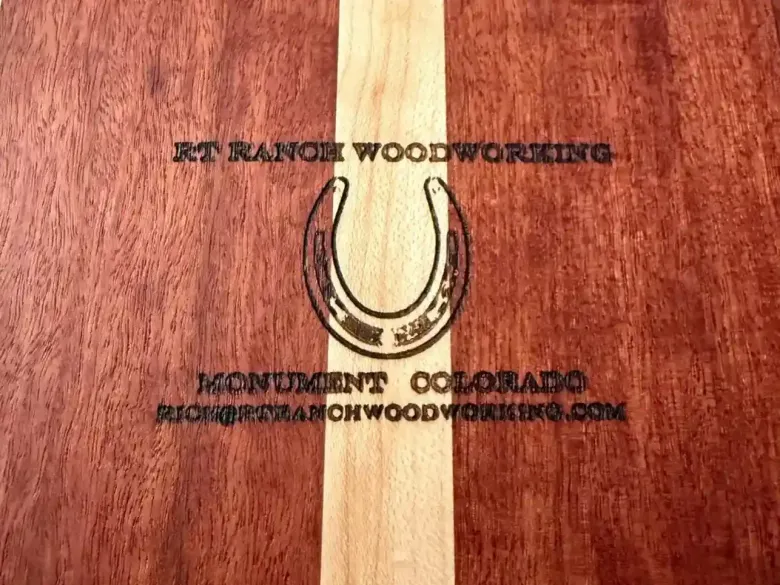 Woodgrain background with a horseshoe logo and “KJ Ranch Woodworking” text