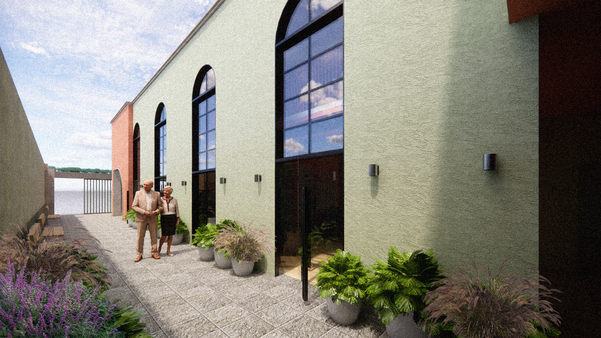 Un par de personas paradas frente a un edificio.