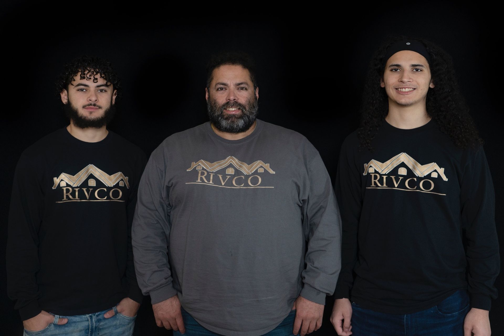 Three people wearing long-sleeved shirts with 