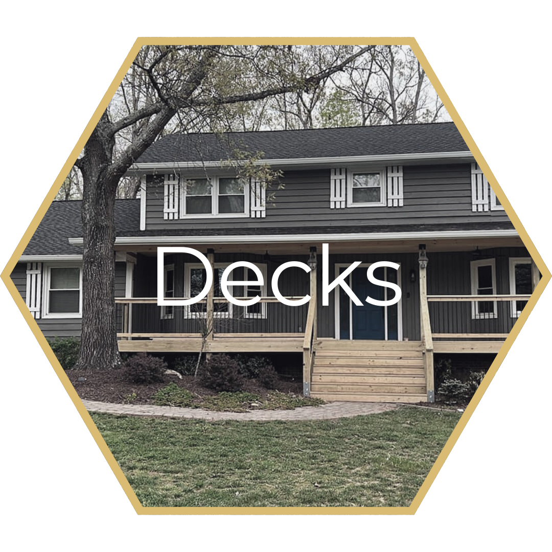 A gray house with a wooden deck; the text