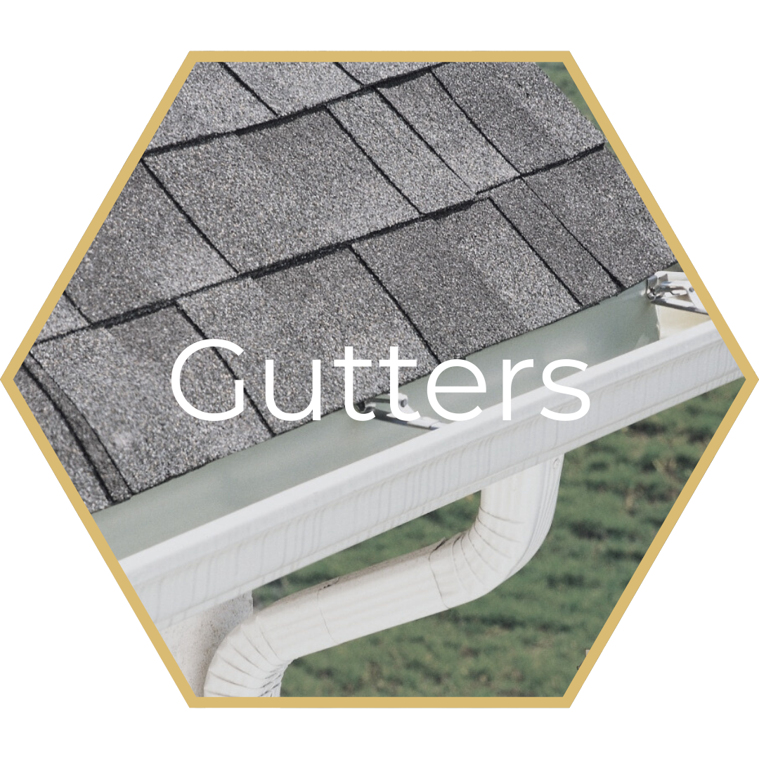 White gutters along a gray shingle roof, angled downward.