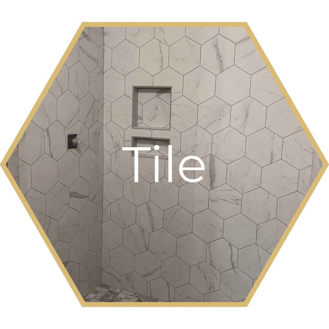 Hexagon-tiled shower wall with marble-like pattern and built-in niches;