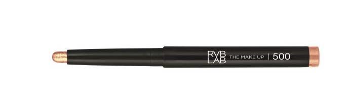 Makeup stick with a nude-colored tip and a dark, cylindrical body.