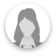 Silhouette of a woman in a blazer, inside a gray circle.