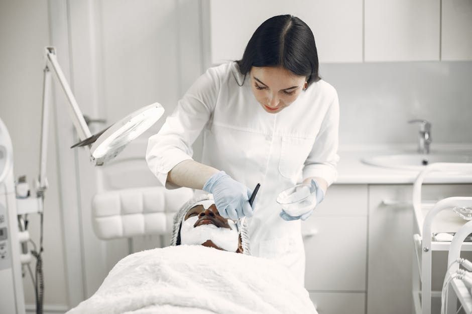 Dentist examining a patient in a bright white treatment room