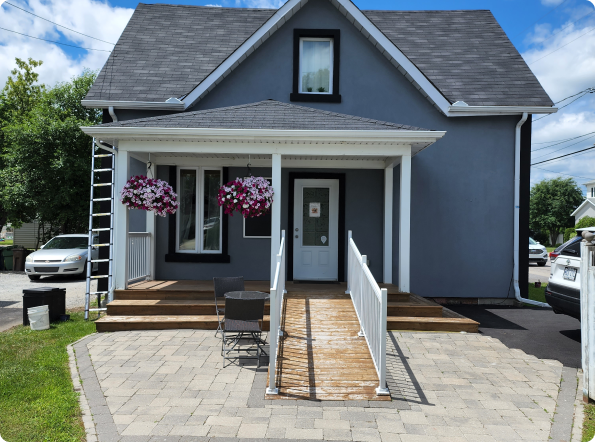 A house with a ramp leading to the front door