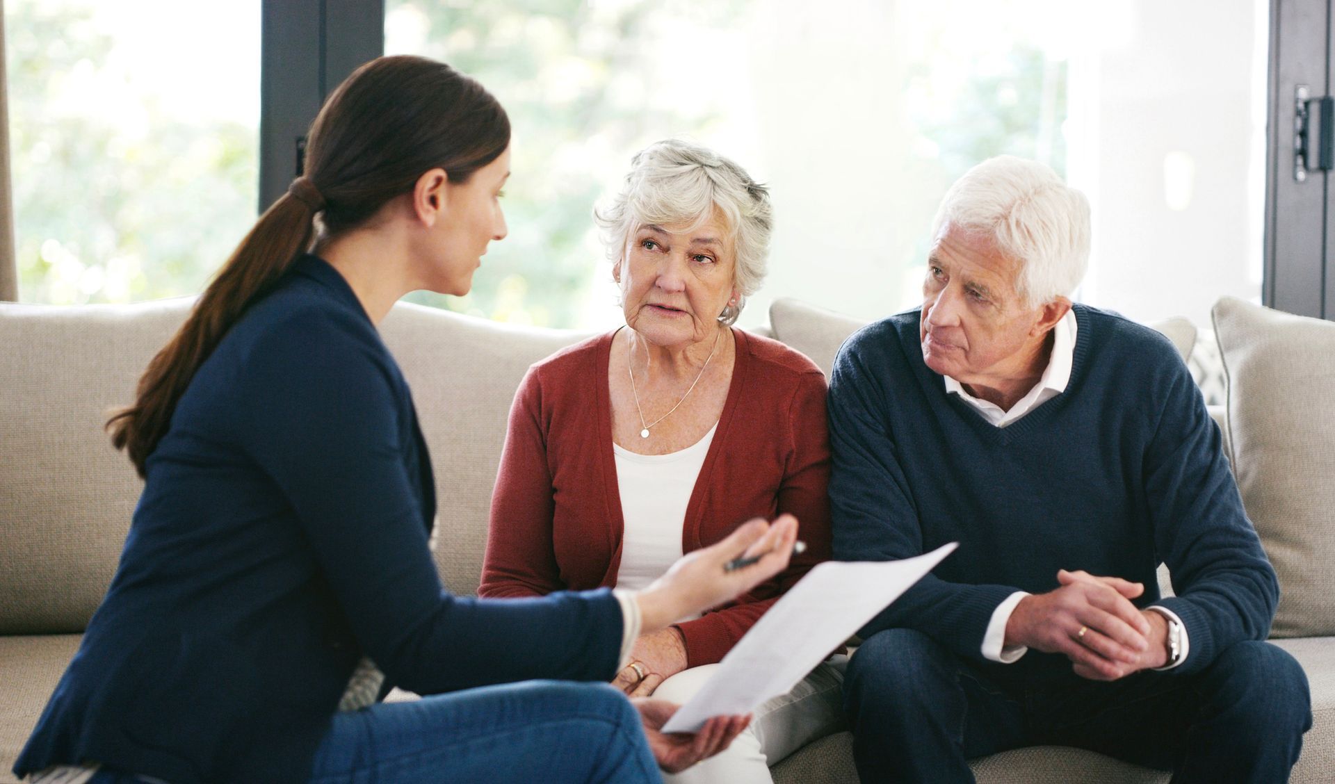 An estate planning lawyer from Dunn & Hemphill, PA, with an elderly couple in Philadelphia, MS.