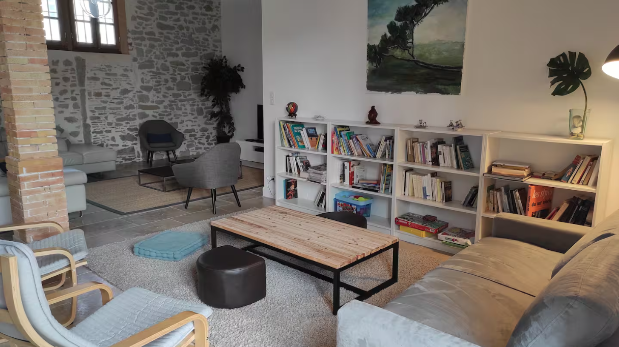 A living room filled with furniture and a coffee table.