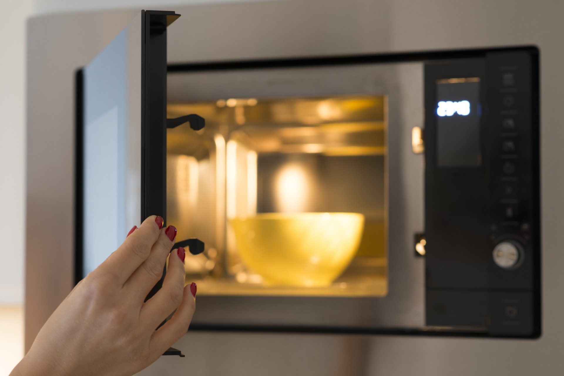 a microwave with a bowl inside