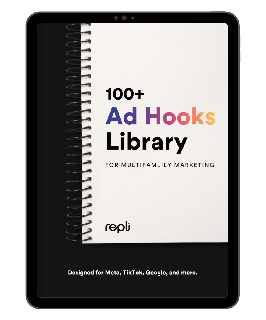 A tablet screen shows a spiral-bound book titled 