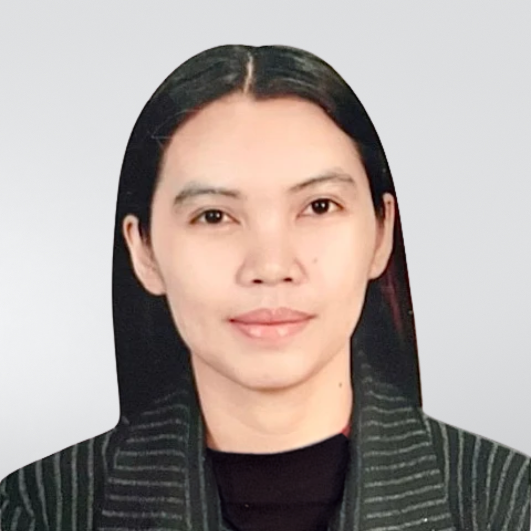 A headshot of a person with long dark hair, wearing a dark green striped collared jacket, against a light gray background.