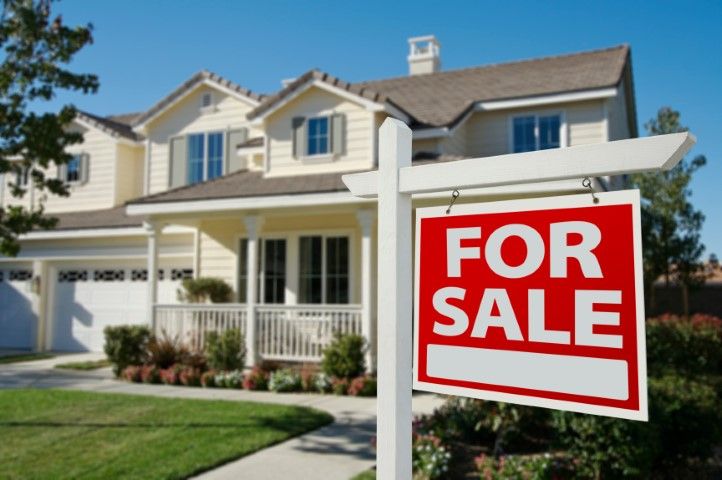 New home with a For Sale sign