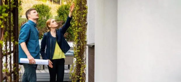 outside a home, an issue is pointed out for a man